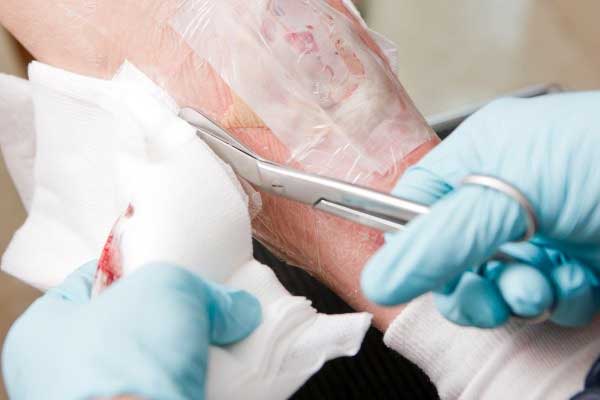 wound being bandaged