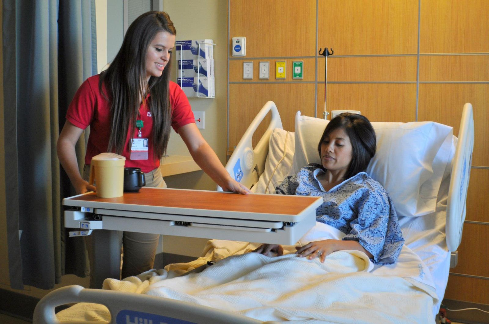 Picture 048 Nurse helping patient in a room